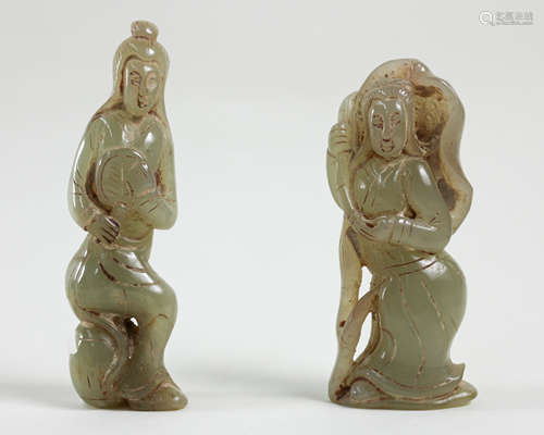 TWO HUMAN SHAPED JADE PENDANTS