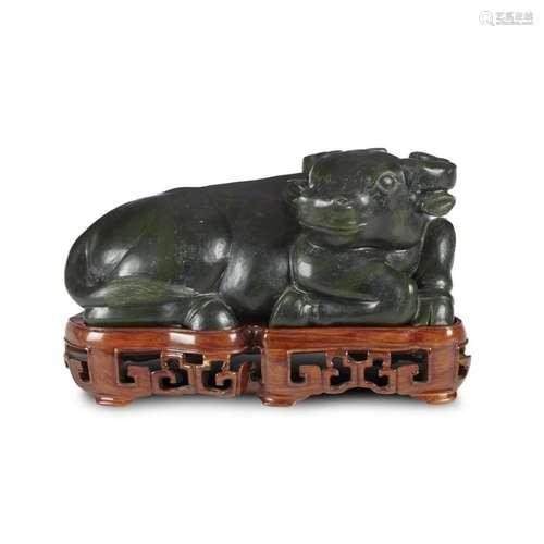 Chinese carved spinach jade figure of a recumbant buffalo,