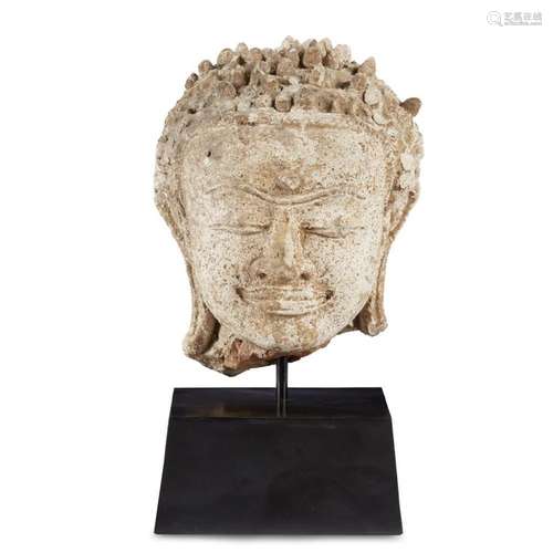 A Southeast Asian style stucco head of a Buddha,