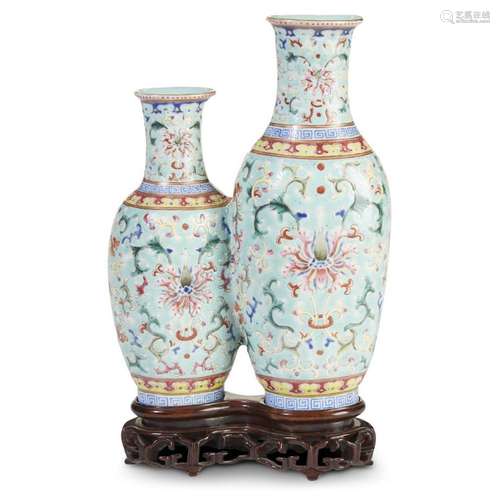 A Chinese famille rose-decorated porcelain double vase with carved hardwood stand, qing dynasty, qianlong six-character mark