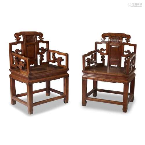 A pair of Chinese carved hardwood armchairs, qing dynasty