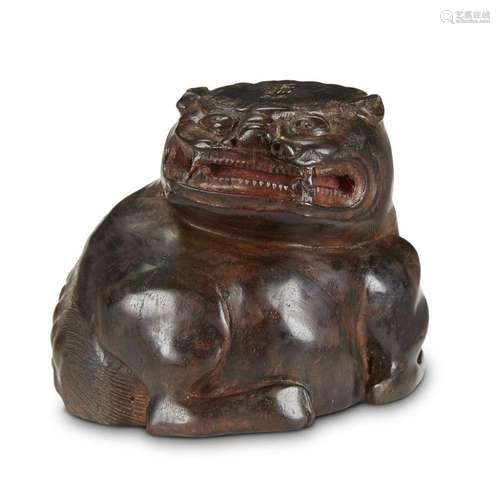 A Chinese carved hardwood lion-form cup,