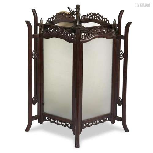 A Chinese carved hardwood and frosted glass hexagonal hanging lantern,