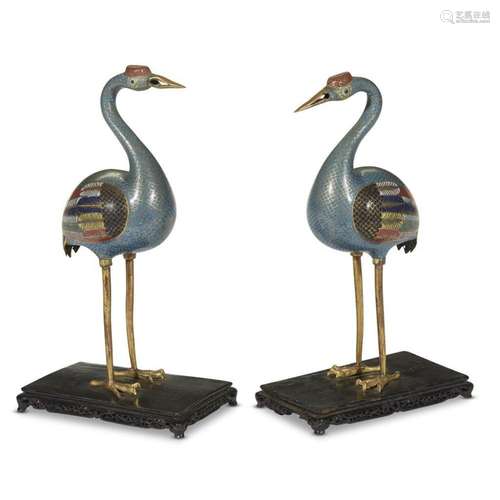 Pair of Chinese cloisonné cranes on later lacquered wood stands, qing dynasty, qianlong/jiaqing period