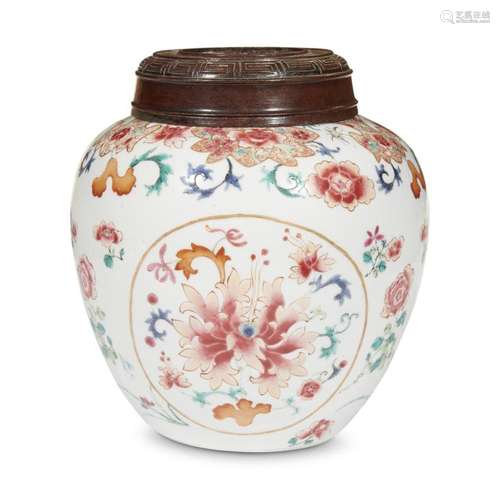 A Chinese famille rose-decorated porcelain jar with later wood cover, the jar qing dynasty, possibly 18th century