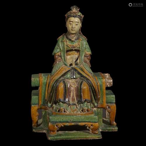 A Chinese sancai-glazed stoneware figure of a seated female immortal, ming dynasty