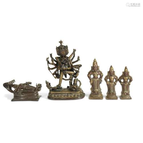 Four Indian and one Sino-Tibetan copper alloy devotional figures, 17th-19th century