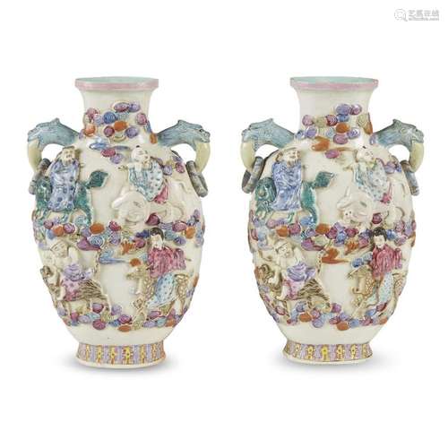 A pair of Chinese famille-rose decorated molded porcelain 