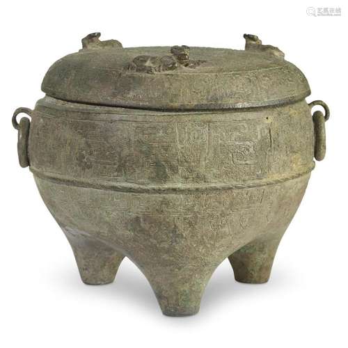 A Chinese bronze tripod vessel and cover, Ding, in the style of the spring and autumn / warring states period