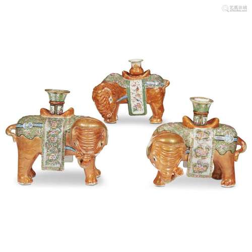 Three Chinese export porcelain famille rose-decorated elephant-form candle holders,