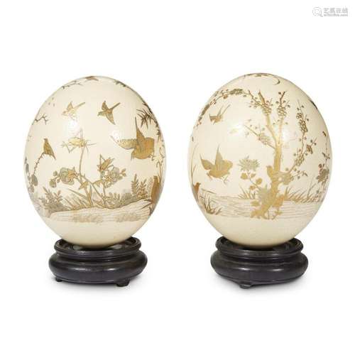 A matched pair of Japanese gilt lacquer-decorated ostrich eggs,