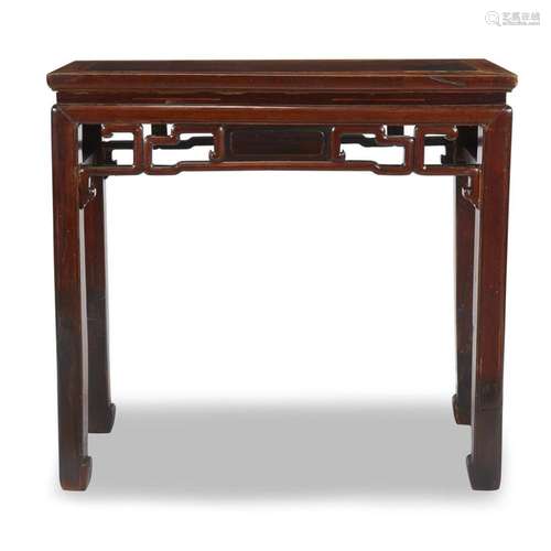 A Chinese lacquered wood table,