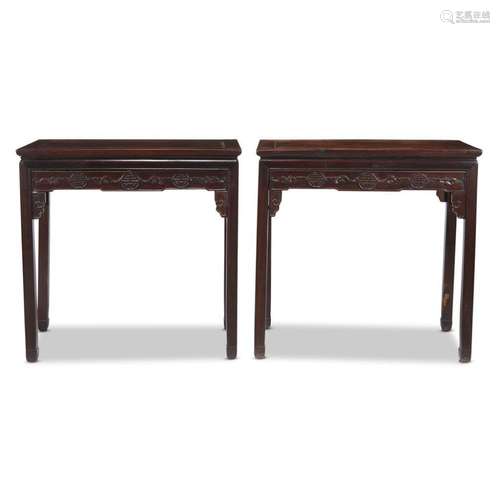 *A pair of Chinese carved hardwood, possibly 