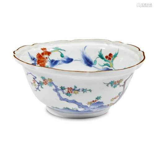 A Japanese enameled porcelain bowl, Arita, decorated with birds, flowers, and maple on rockwork, edo period, 18th century