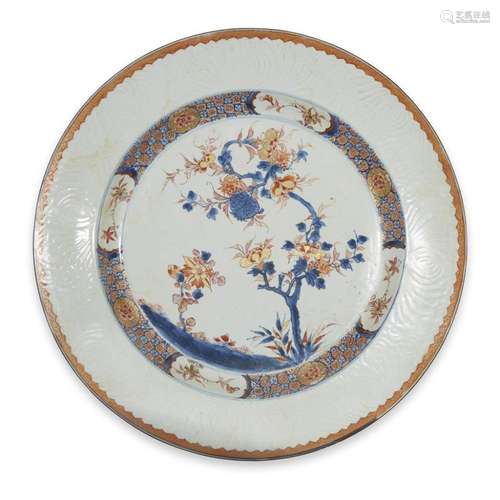 An unusual Chinese export porcelain charger with carved border, 18th century