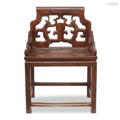 A Chinese carved wood fretback chair,