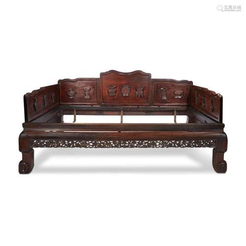 *A Chinese carved hardwood, possibly 