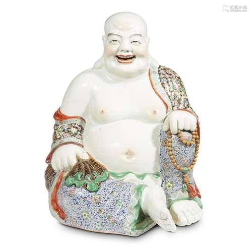 A large Chinese famille-rose-decorated porcelain figure of Budai seated,