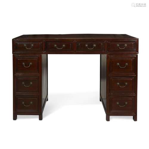 A Chinese lacquered and figured wood double pedestal desk,