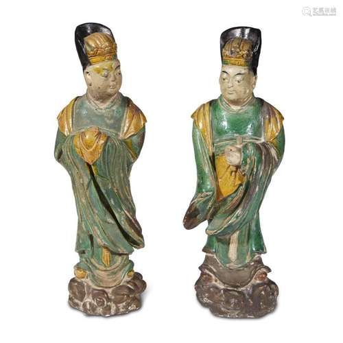 A pair of Chinese sancai-glazed pottery figures of officials, ming dynasty