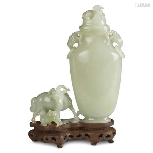 A finely carved Chinese celadon jade 