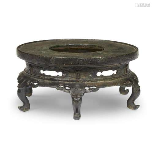 An unusual Chinese bronze stand, yuan-ming dynasty