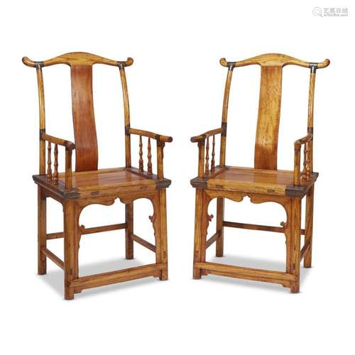 A pair of Chinese yoke-back armchairs,