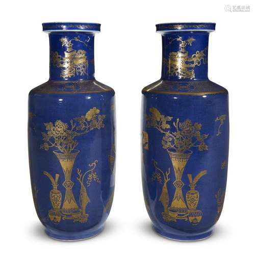 A pair of Chinese gilt-decorated bleu souffle-glazed porcelain rouleau vases, late 19th century