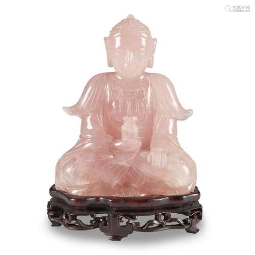 A Chinese carved rose quartz figure of seated Buddha,