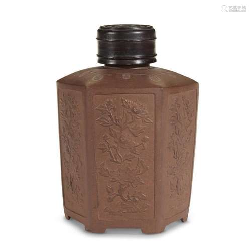 A Yixing stoneware molded hexagonal tea caddy with later turned wood cover, qing dynasty