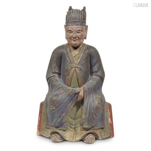 A Chinese carved and painted wood seated male ancestor figure, late qing dynasty