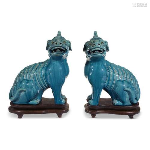 A pair of Chinese turquoise-glazed pottery luduan, qing dynasty