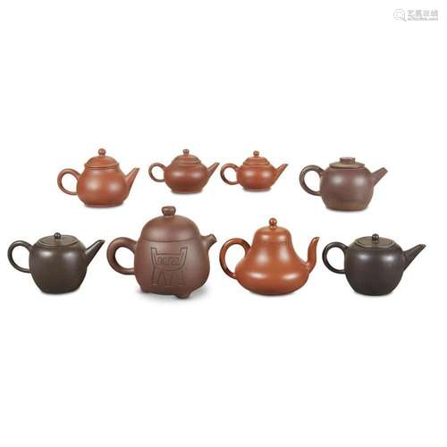 A collection of eight Chinese Yixing stoneware teapots, 20th century