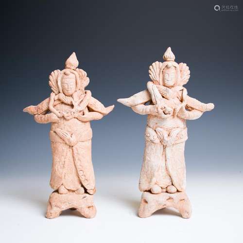 A PAIR OF BUFF POTTERY GUARDIANS, TANG DYNASTY