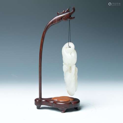 A WHITE JADE PENDANT WITH HANGER