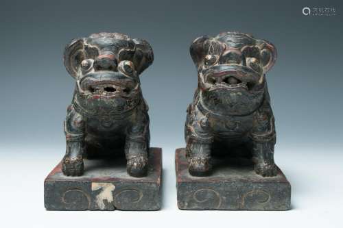 A PAIR OF LACQUER WOOD BUDDHIST LIONS, 19TH C.