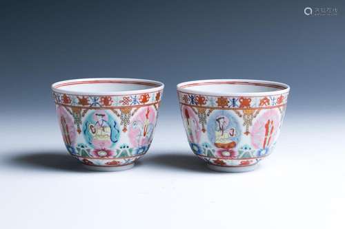 A PAIR OF FAMILLE-ROSE 'BUDDHIST EMBLEMS' CUPS