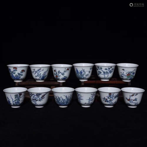 A SET OF BLUE&WHITE FLORAL PATTERN CLASHING COLOR CUPS