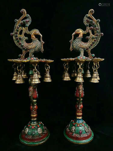 A PAIR OF TIBETAN BRONZE PAINTING CANDLE STICKS