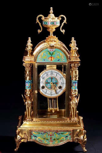 A GILT BRONZE COLOUR ENAMELS CLOCK