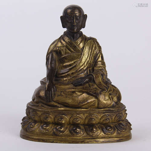 TIBETAN GILT BRONZE SEATED GURU