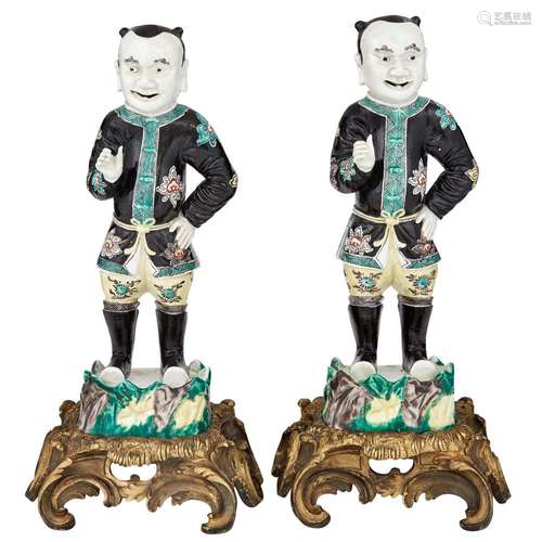 Pair of Chinese Famille Verte Glazed Porcelain Foreign Attendants