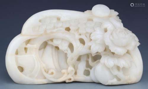 A RARE AND FINELY CARVED WHITE JADE DECORATION