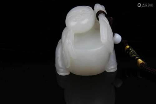 A FINE HE TIAN GREENISH WHITE JADE IN FIGURE OF BOY PLAYING