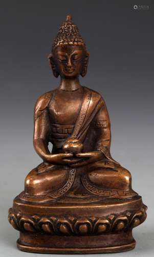 A BRONZE MODEL OF AKSHOBHYA BUDDHA