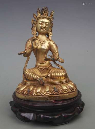 A REAR GILT BRONZE TREASURE BUDDHA FIGURE