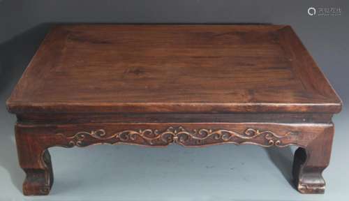 A FINELY CARVED REDWOOD BED-TABLE