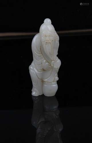 A FINE HE TIAN JADE IN FIGURE OF OLD MAN