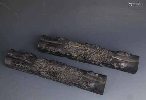 PAIR OF BLACK HARDWOOD CARVING PAPER WEIGHT