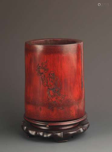 A BAMBOO HOLDER WITH BODHIDHARMA POETRY